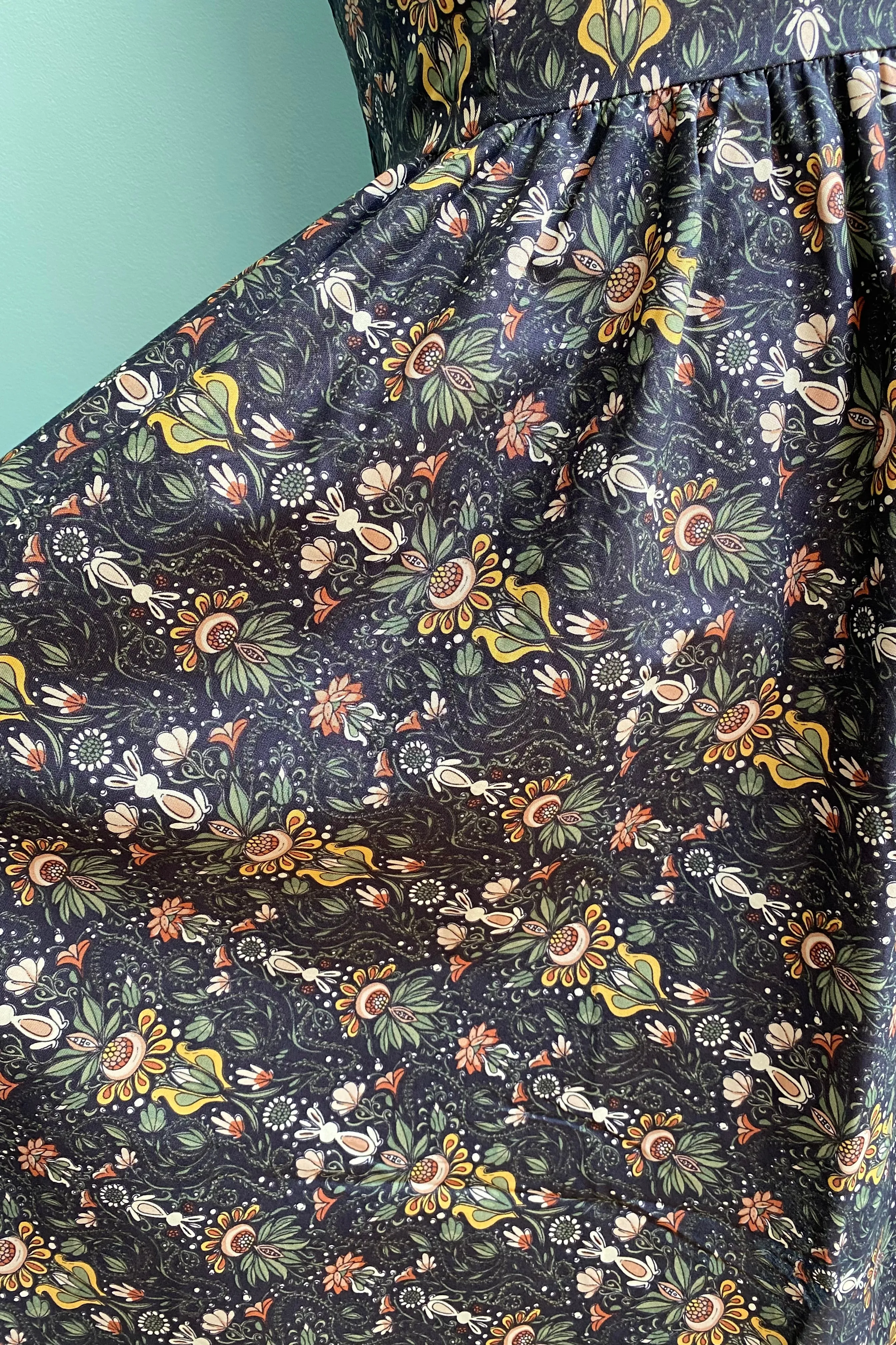 Folk Art Floral & Bunny Midi Dress in Navy by Retrolicious